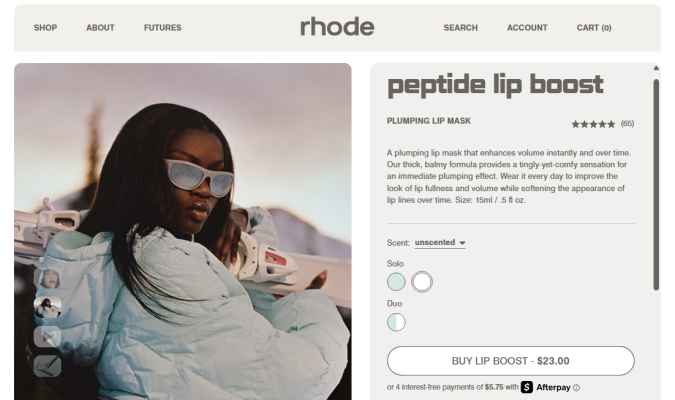 Rhode Skin product page for Peptide Lip Boost plumping lip mask at $23 with model photo and buy CTA.